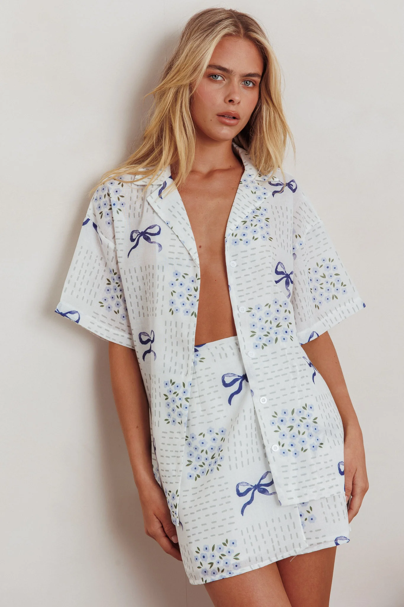 Ithaca Wrap Mini Skirt Bow Print Blue - Image 6